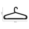 Percha de plástico antideslizante para el hogar, sencilla, para colgar pantalones, para secar ropa en blanco y negro, sin costuras, ahorra espacio, con arco de almacenamiento audaz.