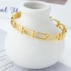 Pulsera sencilla de moda europea y americana transfronteriza de acero de titanio con forma de herradura a cuadros hueca pulsera de acero inoxidable para damas al por mayor