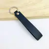 Chaveiro de PU de cor sólida transfronteiriço, cordão de mão de couro de cor doce criativo, chaveiro de carro simples para homens, atacado