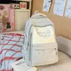 Mochila Nova Tendência de Grande Capacidade e Alta Aparência Estilo Coreano Mochila para Aluno do Ensino Fundamental Bolsa Escolar Casual Ins Nicho para Mulheres