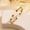 Pulsera de titanio y acero de alta gama transfronteriza con diamantes pulsera de acero inoxidable oro real de 18k galvanizado en horno pulsera abierta para mujer