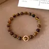 Pulsera Geométrica de Zirconia y Ojo de Tigre Estilo Retro Maillard con Cuentas Pulsera de Lujo Ligero de Gama Alta Joyería de Mano Personalizada de Moda