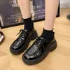 Zapatos de cuero para mujer de suela gruesa estilo británico 2026 nuevo resorte versátiles negros mocasines JK zapatos de plataforma tendencia ins