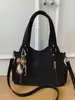 Bolsa de Mão Versátil Nova Outono e Inverno 2025 Bolsa de Ombro Feminina Bolsa Tote de Grande Capacidade para o Dia a Dia Bolsa Transversal Bolsa de Viagem