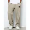 Sitio web independiente Ropa de primavera y otoño para hombre transfronteriza europea y americana, pantalones de chándal holgados y fluidos de pierna recta, pantalones deportivos casuales de pierna ancha para comercio exterior