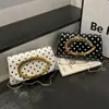 Moda de Lunares con Herrajes Metálicos 2026 Nuevo Estilo de Verano para Mujer Elegante Bolso Pequeño Cuadrado de Hombro Cruzado de Gran Capacidad para la Noche