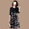 Vestido primavera y otoño nuevo hermana gorda talla grande ropa de mujer cubre barriga suelto 200 catties falda de longitud media