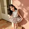 Directo del fabricante: Conjunto de shorts de verano con estampado floral para pastel, elegante conjunto de dos piezas de falda-pantalón para bebé de 26, estilo nuevo con pequeñas mangas acampanadas para niñas