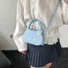 2026 Verano Nuevo Elegante Lindo Gato Dibujos Animados Femenino Simple Versátil Moderno Bolso de Hombro Cruzado Bolso de Mano