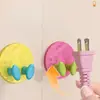 Gancho de enchufe sin clavos de colores dulces, adhesivo fuerte para montaje en pared en dormitorio y cocina, para organizar y asegurar cables de alimentación, enchufes y tomas de corriente