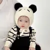 Gorro de punto estilo tejido con forro de algodón para niños, gorro de lana para otoño e invierno, gorro de felpa con protección para las orejas y gorro cálido con diseño de animales para bebés.