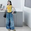 Conjunto de Verano para Niñas 2026 Nuevo Chaleco Casual Estilo Coreano Estampado para Niñas Mayores Combinado con Jeans de Pierna Ancha