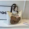 Bolso de tela estilo japonés con dibujos animados para estudiantes, de un solo hombro, de gran capacidad, versátil, de lona para clase