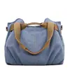 2026 Moda Coreana Versátil Casual Bolsa de Ombro Transversal Nova Retro Tendência Casual Bolsa de Lona para Mulheres