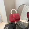 Bolso Nuevo para Mujer Primavera y Verano 2025 Estilo Coreano Popular Cadena de Perlas Moda Bolso Pequeño Bandolera Cruzado Portátil Bolso Cuadrado Pequeño