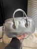 2025 Verano Nueva Moda de Alto Valor Bolso de Béisbol de Mano Bolso de Hombro Simple para Mujer Trendy Casual Nicho Bolso de Mujer