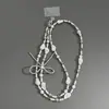 Cadena Plateada Ins Perla Amor Lazo Cadena para Teléfono Móvil Cruzada Se Puede Colgar en el Cuello Cadena para Teléfono CCD Colgante para Mujeres