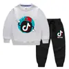 Conjunto de Ropa Infantil Estilo Coreano Nuevo para Primavera y Otoño 2026: Conjunto de Dos Piezas de Sudadera y Pantalón Largo para Niños, Conjunto de Algodón de Manga Larga Tiktok