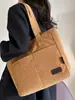 Otoño 2026 Nuevo Lona Gran Capacidad Moderno Alta Apariencia Color Sólido Moda Sensación Relajada Bolso Tote para Trabajar y Viajar