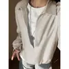 Camisa a rayas de manga larga de dos piezas falsas para hombres y mujeres, camisa de primavera de alta gama con dobladillo elástico, chaqueta en capas estilo americano para parejas
