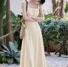 Vestido longo amarelo com colete e suspensórios, estilo francês, modelo 2025, perfeito para férias na praia na primavera e no verão.