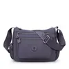 Bolso tote de nailon con múltiples compartimentos para mujeres de mediana edad y mayores, nuevo estilo 2025, moderno, gran capacidad, bolso de hombro versátil