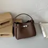 Bolso Tote Pequeño Súper Caliente para Mujer 2026 Nuevo Verano Popular de Gama Alta para Viajes Diarios Hombro Único Cruzado Bolso Cubo