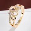 Elegante anillo hueco estilo Chanel de corazón a corazón, moderno y exquisito, versátil, anillo de cobre puro para mujer, artículo popular transfronterizo al por mayor