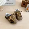 Zapatillas deportivas para niños 2026 nuevo modelo de otoño zapatillas para niñas puntera de concha zapatillas de entrenamiento alemanas zapatillas de moda para niños versión coreana