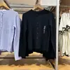 Suéter cárdigan de punto para mujer, estilo nuevo Otoño/Invierno 26, con cuello redondo y patrón de trenzado, chaqueta larga para aire acondicionado 488288