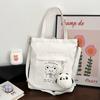 Bolso Sencillo de Otoño e Invierno Nuevo Estilo Bolso de Lona Texturizado y Atmosférico para Mujer 2023 Mochila Escolar para Estudiante Bolso de Mano de Dibujos Animados