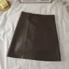 Negro Nuevo estilo falda ajustada pequeña anti-exposición falda cintura alta primavera y otoño tubo falda de cuero PU cuero aA