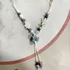 Collar con colgante de campana de mariposa de cerámica de estilo étnico retro para mujer, diseño nuevo y moderno, cadena larga para suéter, accesorios
