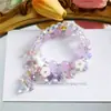 Novo Bracelete Elegante Feminino de Pérola e Cristal com Pingente de Flor Pequena Fresca Elástico Ajustável Bracelete Galvanizado em Concha
