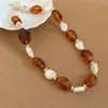 Collar de doble capa con cuentas acrílicas transfronterizo europeo y americano, cadena para la clavícula de lujo ligero de alta gama, joyería de estilo étnico vintage al por mayor