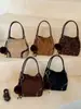 Bolso cubeta retro de nicho 2026 principios de otoño nuevo bolso de mano estampado de leopardo bolso de hombro mate bolso bandolera de gamuza para mujer