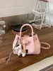 Bolso de Mano Tejido a Mano de Nicho Coreano para Mujer 2026 Nuevo Estilo Primavera Bolso Tote Cesta con Acabado de Alta Gama, Diseño Acolchado de un Solo Hombro