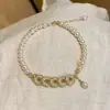 Nuevo brazalete de perlas con moneda de cinco emperadores dorada estilo chino, con un diseño refinado, elegante y moderno que complementa cualquier atuendo, ofreciendo un look único y de alta gama