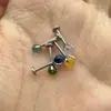 Color caramelo cuentas de vidrio color acero titanio dientes internos 1.0 dientes clavo de labio clavo de hueso de oreja Europa y Estados Unidos transfronterizo perforación joyería Yiwu