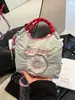 Bolsa de Dona de Nailon Bordada Estilo Ins Japonés 2025 Nueva Moda Mini Bolsa para Viajero Diario Bandolera de un Solo Hombro Bolsa Pequeña