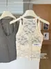 Moda de principios de otoño Camiseta sin mangas de encaje empalmado Caliente Polar de oxígeno Perla Costilla Sexy Copa Integrada Hermosa Espalda Ropa Interior 692