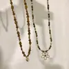 Collar Colgante de Flor con Cuentas de Piedra Ojo de Tigre Melard para Mujer 2026 Nuevo Diseño Nicho Colgante Largo Collar para Suéter