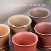 Taza maestra de arena púrpura de Yixing, venta al por mayor, taza de té de barro púrpura de mineral crudo hecha a mano, juego de té de kung fu, taza de té boutique, taza Junde