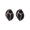 Pendientes retro europeos y americanos en blanco y negro con patrón de leche goteando Pendientes de estilo palaciego con esmalte de color contrastante en forma de gota Pendientes de estilo antiguo