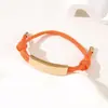 Al por mayor al contado transfronterizo Pulsera de doble cordón de ajuste Pulsera de cuerda trenzada ajustable de acero inoxidable multicolor con impresión y grabado de color UV