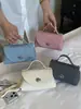 Bolso pequeño súper popular transfronterizo para mujer, nuevo modelo de verano 2026, bolso de hombro de alta gama, bolso cuadrado pequeño cruzado