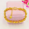Pulsera hueca exquisita de latón chapado en oro al por mayor, chapado al vacío, joyería de imitación de oro, ventas directas de fabricantes, joyería para damas