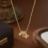 Cadena de Clavícula Elegante Chapada en Oro Real con Microincrustaciones de Circonita para Mujer, Diseño de Nicho Cadena para la Cintura Collar Cadena para Suéter de Trébol de Cuatro Hojas