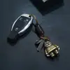 Llavero Simple Tejido a Mano de Cuero Genuino Aleación Dibujos Animados Retro Llavero de Piel de Vaca Colgante Creativo Pequeño Regalo