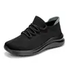 Los nuevos y más recientes zapatos casuales para parejas transfronterizos talla grande versión coreana de tejido volador zapatilla ligera para hombre y mujer zapatillas de correr